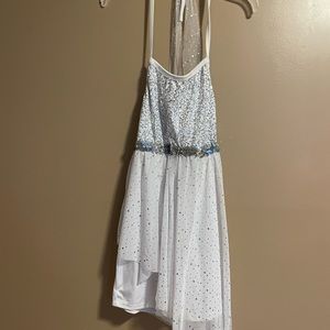 Beautiful dance costume used once. With shorts and a sheer asymmetrical skirt